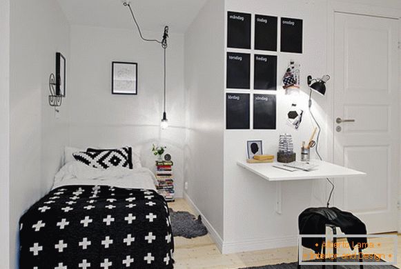 Стильна невелика спальня в чорно-білих тонах