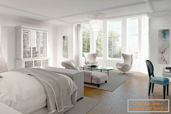 Біло сіра спальня з гарними меблями