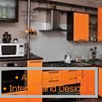 Стильна кухня в чорно-помаранчевому кольорі