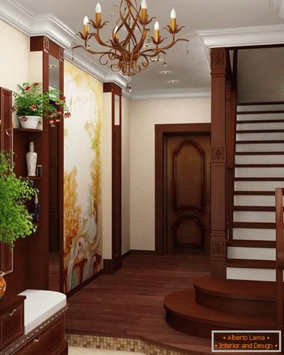 Дизайн невеликого передпокою в приватному будинку зі сходами на 2-й поверх