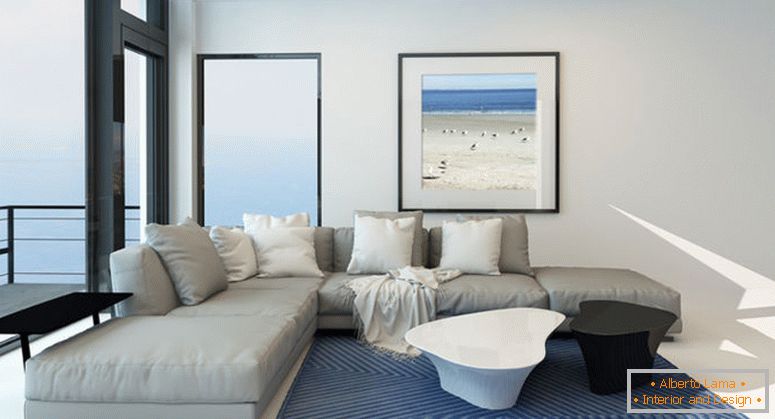 Сучасна вітальня на набережній з яскравим просторим салоном інтер'єру з комфортним сучасним м'яким сірими люксами, мистецтвом на стіні та великим вікном з панорамним видом вздовж однієї стіни з видом на океан.