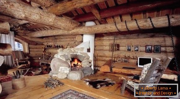 Дерев'яний будинок всередині в стилі кантрі з піччю-каміном