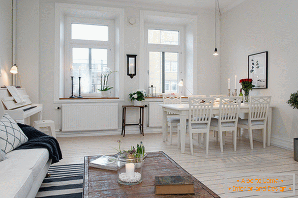 Вітальня і їдальня квартири в скандинавському стилі в Гетеборзі