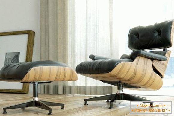 Чорне крісло Eames lounge з підставкою під ноги