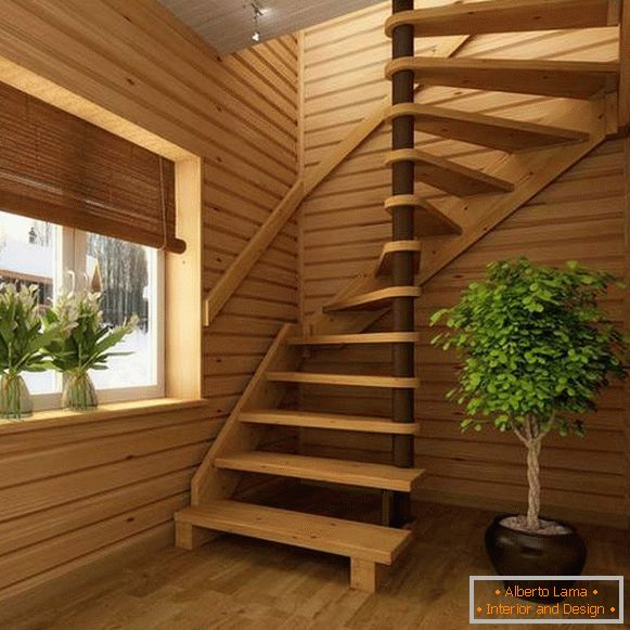 Сучасні гвинтові сходи в приватному будинку з дерева