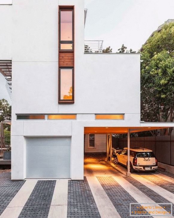 Будинок в стилі мінімалізм з навісом для авто