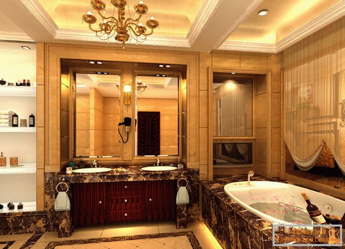 Величезна ванна в стилі ампір майстерно прикрашена дрібними декоративними деталями. Відповідно до вимог стилю підібрані вішалки для рушників, настінні світильники, фіранка з легкої тканини на вікно.