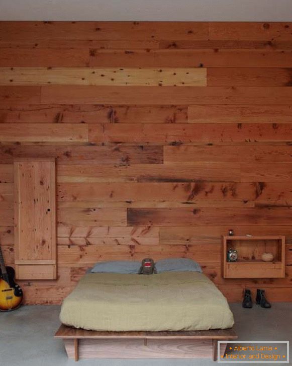 Спальня в мінімалістичному стилі, оформлена деревом