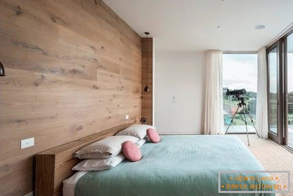 Оздоблення стін деревом - фото сучасної спальні