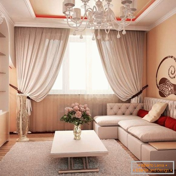 Інтер'єр вітальні в класичному стилі з ліпниною