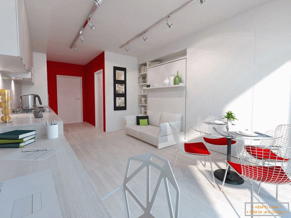 Білосніжний інтер'єр маленької квартирки з червоними акцентами