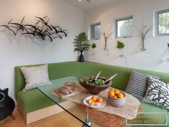 зручний зелений кутовий диван на кухню