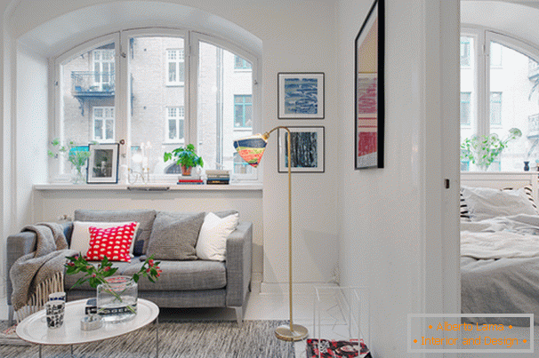 Вітальня і спальня невеликої квартири в скандинавському стилі