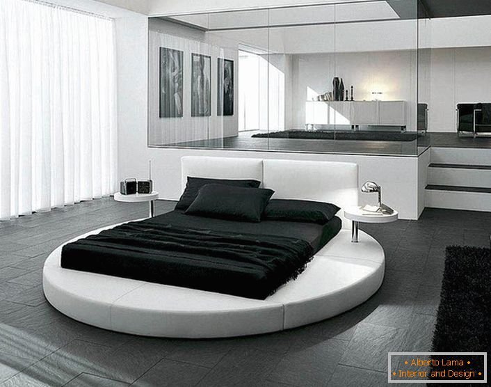 Дизайн спальні в стилі мінімалізм підкреслять правильно підібраною меблями. Цікавою деталлю інтер'єру стає кругла ліжко.