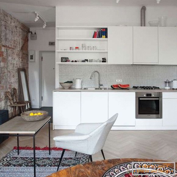 Стильний дизайн однокімнатної квартири - поєднана кухня вітальня