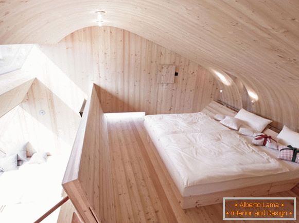 Інтер'єр спальні маленького котеджу Ufogel в Австрії