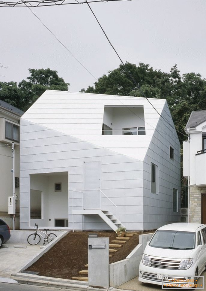 Інтер'єр мінімалістського будиночка з садом в Японії