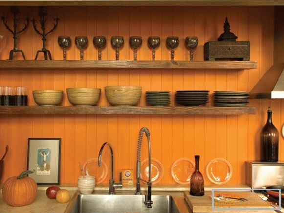 Дизайн кухні з помаранчевими стінами