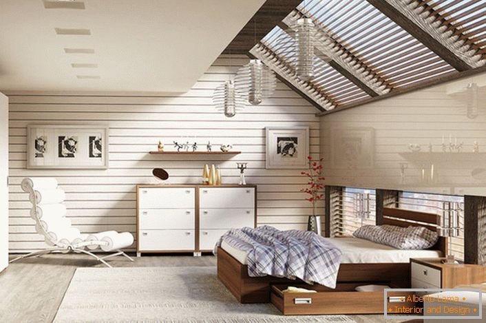 Спальня на мансардному поверсі в скандинавському стилі оформлена з використанням модульних меблів.