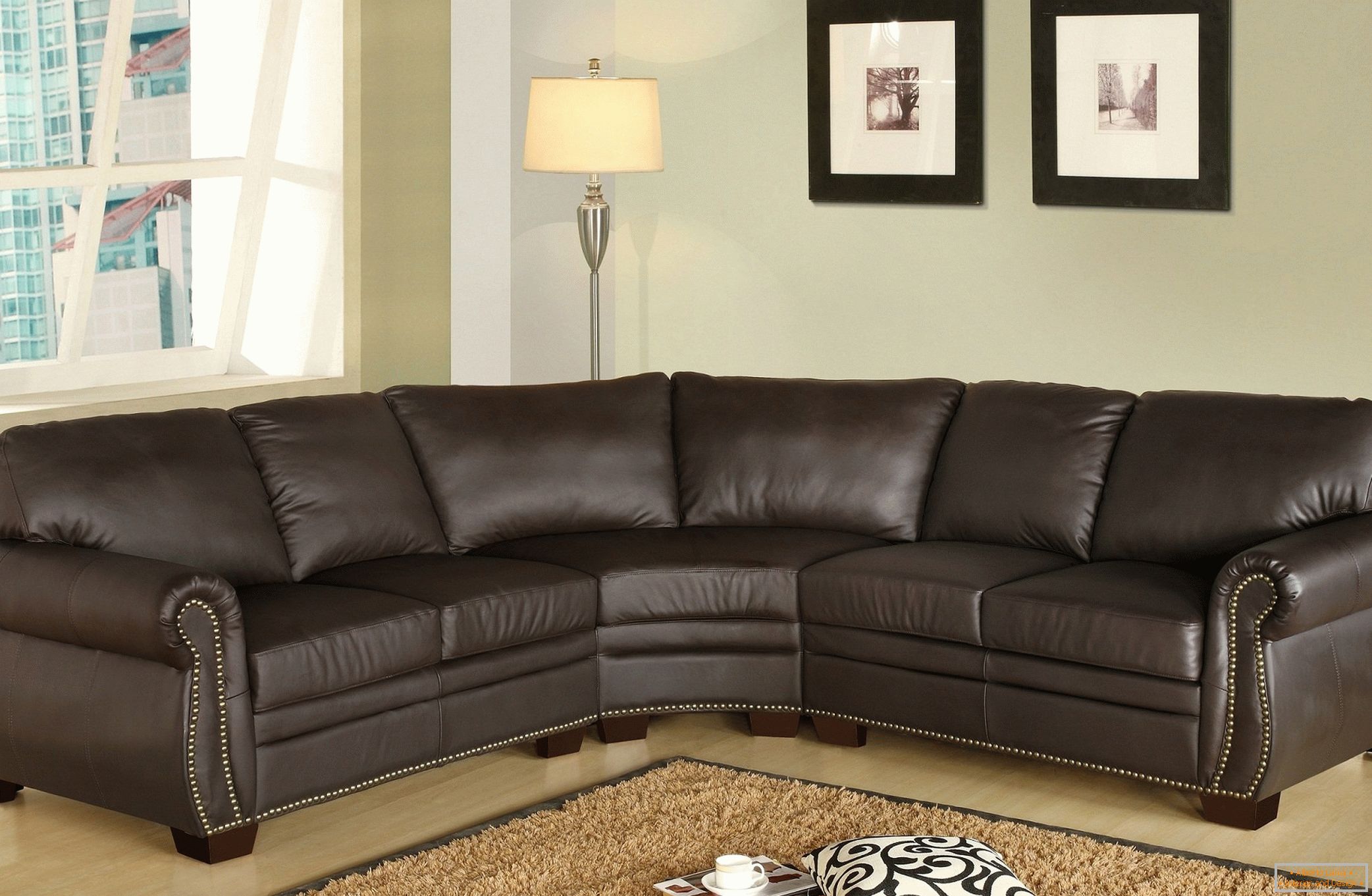 Великий диван з коричневої шкіри