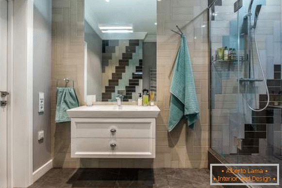 Гарний дизайн ванної кімнати з незвично покладеною плиткою