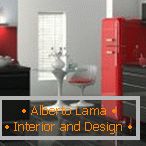 Червоний холодильник і сіра меблі на кухні