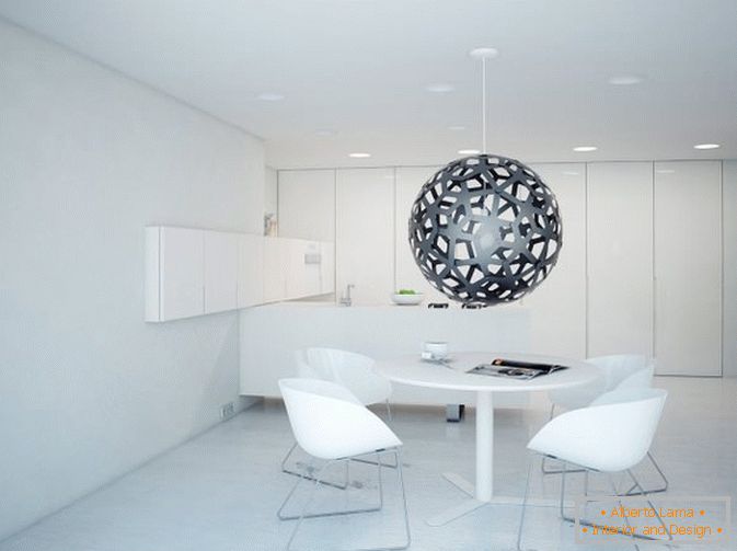 Їдальня квартири-студії в білому кольорі