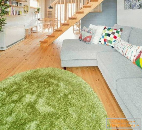 Овальні килими на підлогу - фото зеленого кольору