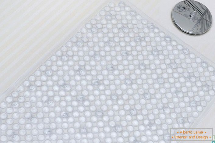 Нековзний килимок підходить для душової кабіни і для ванної. Прозора текстура не порушить концепцію дизайнерського задуму. 