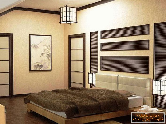 Спальня в стилі японського мінімалізму оформлена в бежевих і коричневих тонах. Увагу привертають прилади освітлення. Стельова люстра виконана в одному дизайні з світильниками. 