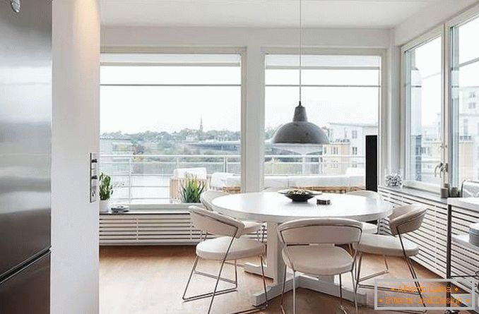 Дизайн кухні з панорамними вікнами в кутовій квартирі