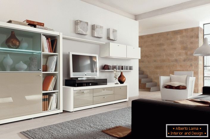 Використання модульних меблів в сучасній вітальні дозволяє не перевантажувати простір кімнати.