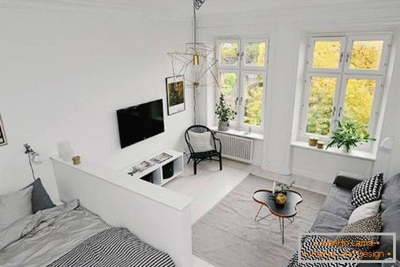 Однокімнатна квартира в скандинавському стилі - вітальня і спальня