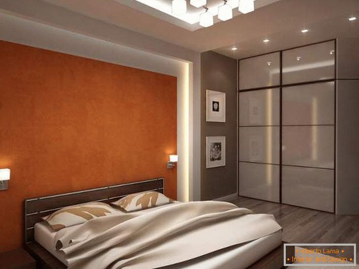 Функціональна спальня з вдало підібраним освітленням виконана в сірих і світло-бежевих тонах. 