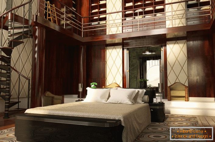 Спальня з високими стелі оформлена досить ефектно. Простір організовано функціонально і просто. Гвинтові сходи ведуть до значного гардеробу.