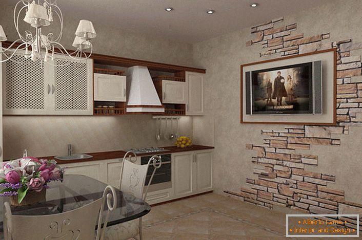 Дизайнерський проект для оформлення невеликої кухні в стилі кантрі. Світлі тони меблів в контрасті темно-коричневої стільницею і підвісними поличками роблять кухню візуально просторішою. Цікаво також оформлення стіни за допомогою природного каменю.