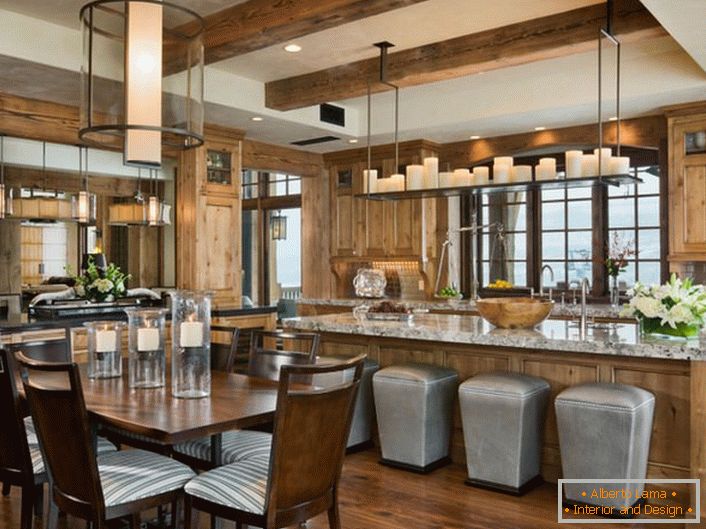 Романтична атмосфера панує на кухні. Зручне зонування кухні на обідню зону і робочу робить простір практичним і функціональним.