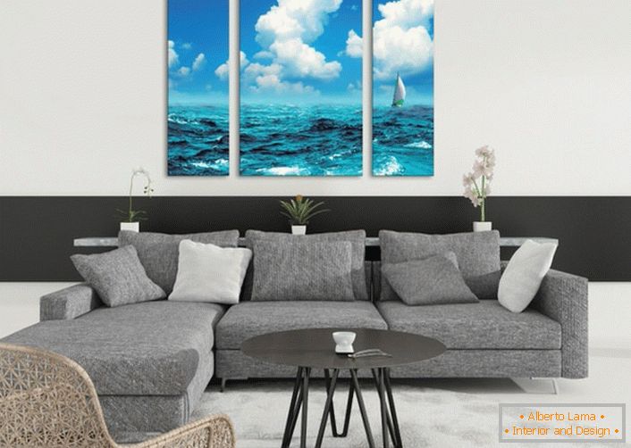 Модульні картини із зображенням моря роблять обстановку у вітальні по-літньому легкою і хвилюючою. 