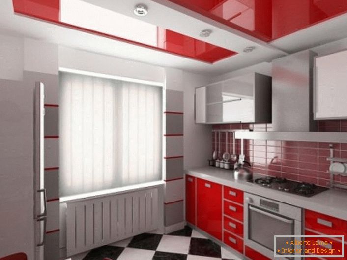 Червоні натяжні стелі - вдалий вибір для кухні з гарнітуром червоного кольору.